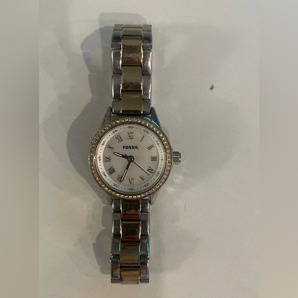 Silver and gold fossil watch
